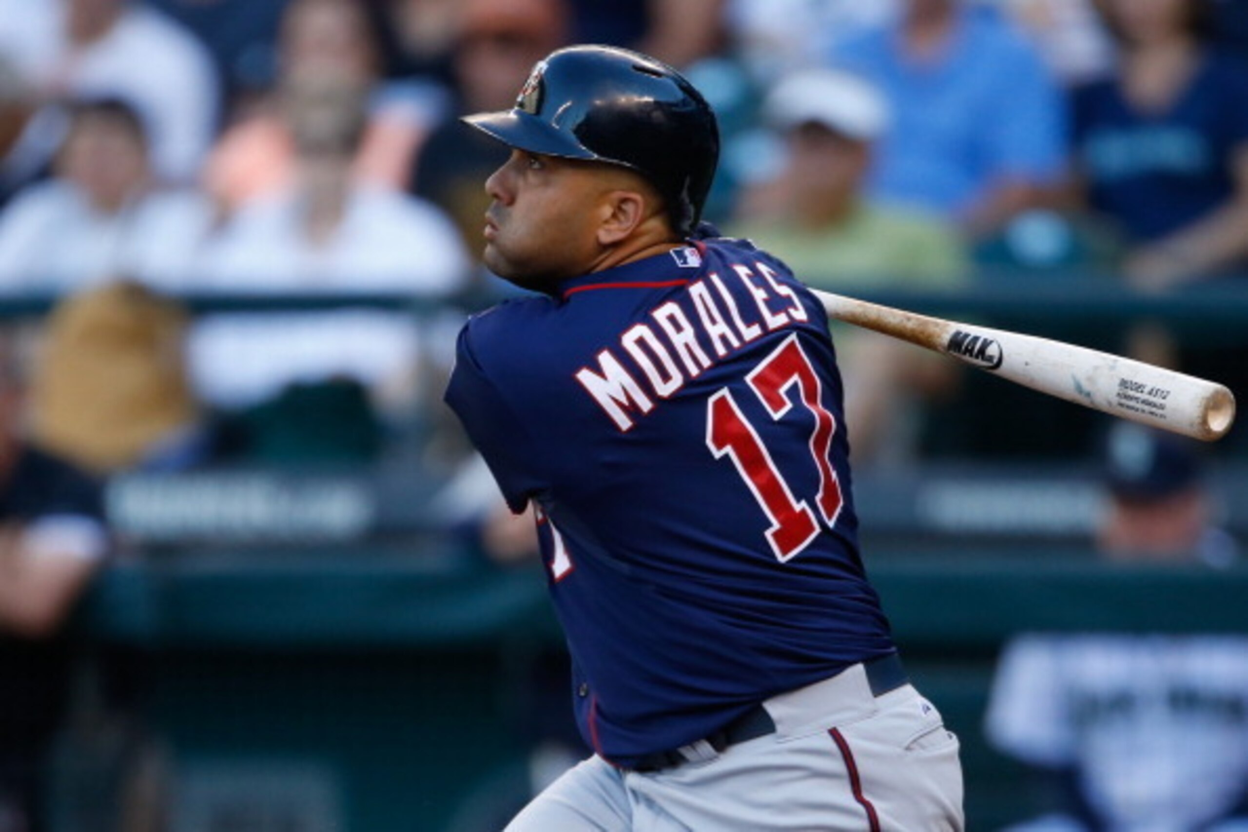 SEATTLE, WA - JULY 08:  Kendrys Morales #17 of the Minnesota Twins bats against the Seattle Mariners at Safeco Field on July 8, 2014 in Seattle, Washington.  (Photo by Otto Greule Jr/Getty Images)