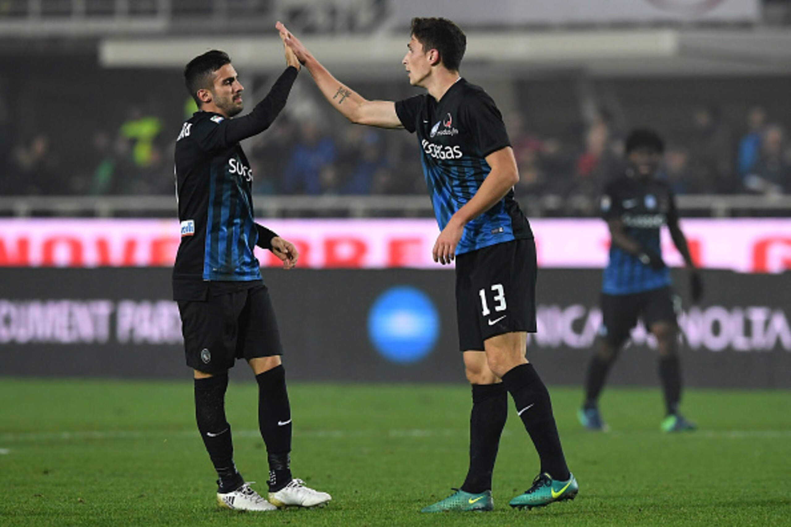 BERGAMO, ITALY - NOVEMBER 20:  Mattia Caldara (R) of Atalanta BC celebrates a goal with team mate Marco D Alessandro during the Serie A match between Atalanta BC and AS Roma at Stadio Atleti Azzurri d'Italia on November 20, 2016 in Bergamo, Italy.  (Photo