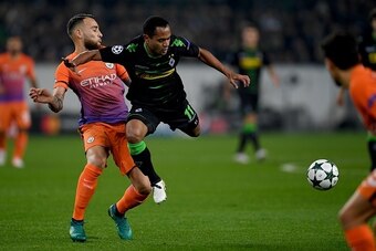 Moenchengladbach's Brazilian midfielder Raffael and Manchester City's Argentinian defender Nicolas Otamendi (L) vie for the ball during the UEFA group C Champions League football match between Borussia Moenchengladbach and Manchester City on November 23, 