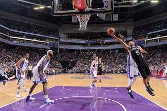 SACRAMENTO, CA - NOVEMBER 16:  Tony Parker #9 of the San Antonio Spurs goes to the basket against the Sacramento Kings on November 16, 2016 at Golden 1 Center in Sacramento, California. NOTE TO USER: User expressly acknowledges and agrees that, by downloa