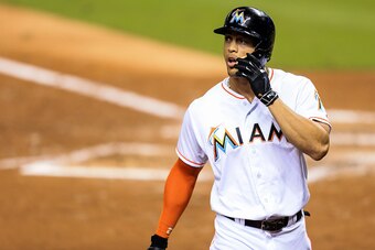 MIAMI, FL - SEPTEMBER 22: Giancarlo Stanton #27 of the Miami Marlins reacts after an out during the fourth inning of the game against the Atlanta Braves at Marlins Park on September 22, 2016 in Miami, Florida. (Photo by Rob Foldy/Getty Images)