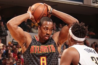 INDIANAPOLIS, IN - NOVEMBER 23:  Dwight Howard #8 of the Atlanta Hawks passes the ball against the Indiana Pacers during the game on November 23, 2016 at Bankers Life Fieldhouse in Indianapolis, Indiana. NOTE TO USER: User expressly acknowledges and agree