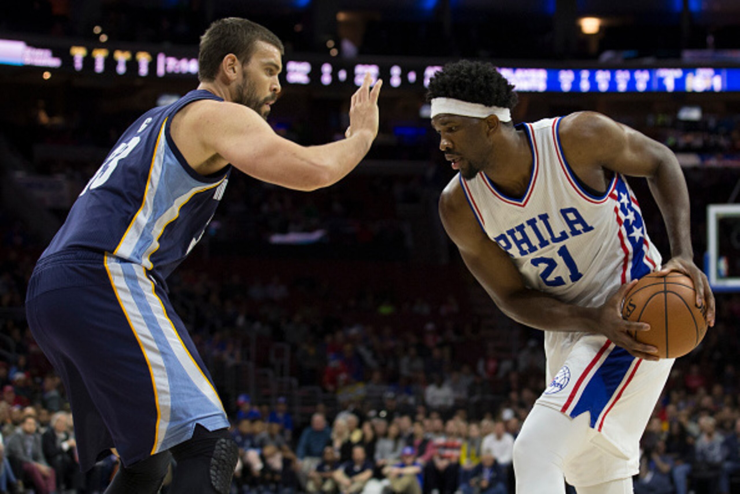 PHILADELPHIA, PA - NOVEMBER 23: Joel Embiid #21 of the Philadelphia 76ers controls the ball against Marc Gasol #33 of the Memphis Grizzlies in the first quarter at Wells Fargo Center on November 23, 2016 in Philadelphia, Pennsylvania. NOTE TO USER: User e