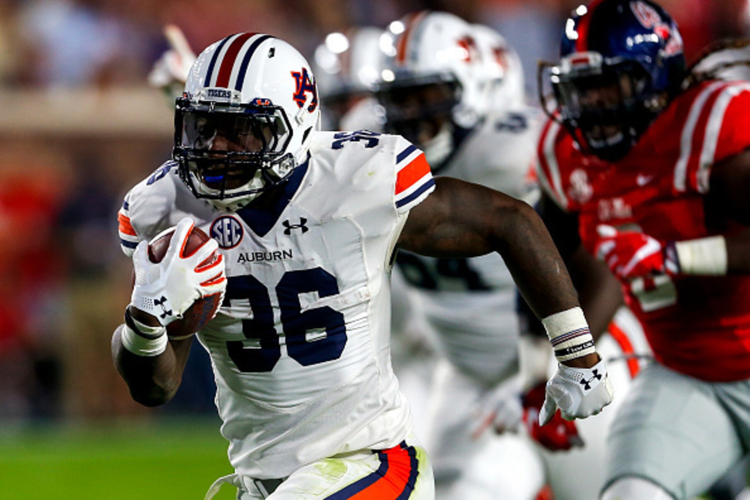 OXFORD, MS - OCTOBER 29:   Running back Kamryn Pettway #36 of the Auburn Tigers breaks free for a touchdown against the Mississippi Rebels during the first half of an NCAA college football game on October 29, 2016 in Oxford, Mississippi. (Photo by Butch D
