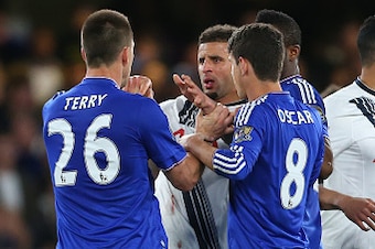 LONDON, ENGLAND - MAY 02 :  John Terry of Chelsea holds back Kyle Walker of Tottenham Hotspur during the Barclays Premier League match between Chelsea and Tottenham Hotspur at Stamford Bridge on May 2, 2016 in London, England.  (Photo by Catherine Ivill -