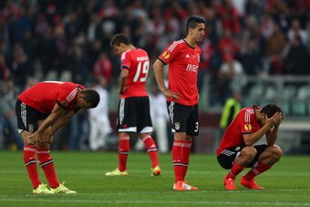 TURIN, ITALY - MAY 14:  Dejected Benfica players looks on after defeat in the penalty shoot out during the UEFA Europa League Final match between Sevilla FC and SL Benfica at Juventus Stadium on May 14, 2014 in Turin, Italy.  (Photo by Michael Steele/Gett