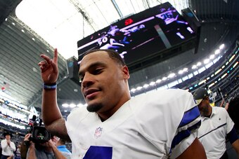 ARLINGTON, TX - NOVEMBER 20:  Dak Prescott #4 of the Dallas Cowboys celebrates after the Dallas Cowboys beat the Baltimore Ravens27-17 at AT&T Stadium on November 20, 2016 in Arlington, Texas.  (Photo by Tom Pennington/Getty Images)