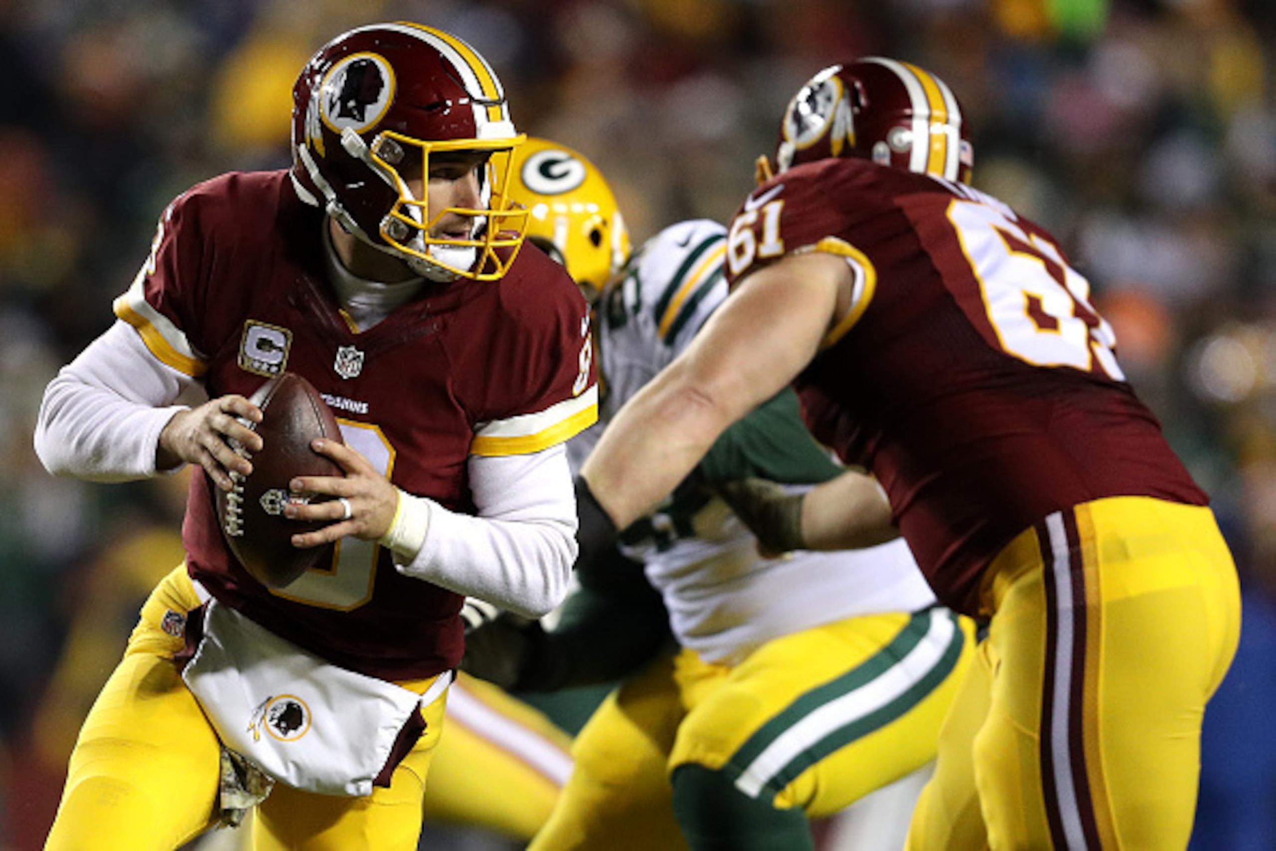LANDOVER, MD - NOVEMBER 20: Quarterback Kirk Cousins #8 of the Washington Redskins drops back to pass against the Green Bay Packers in the second quarter at FedExField on November 20, 2016 in Landover, Maryland. (Photo by Patrick Smith/Getty Images)