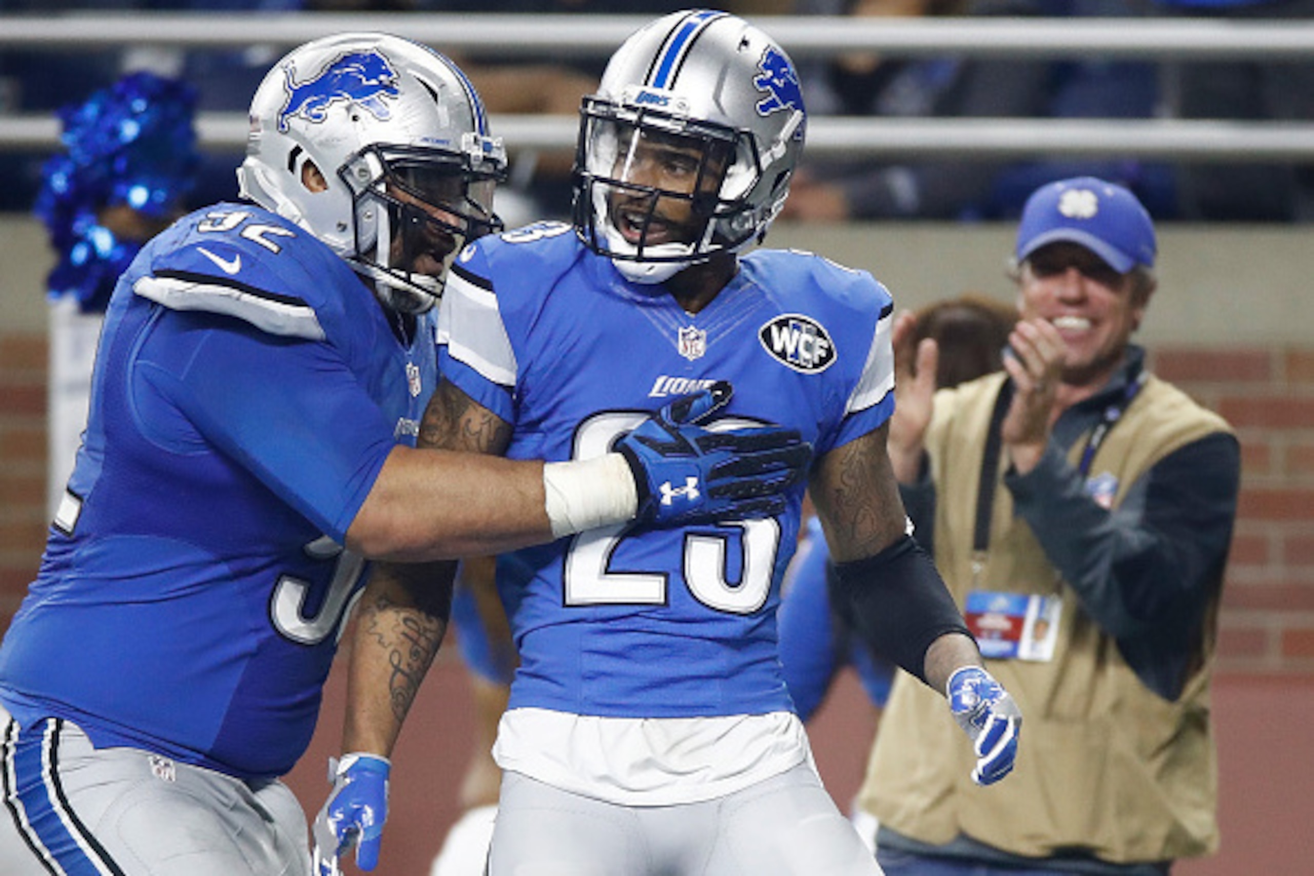 DETROIT.MI - NOVEMBER 24: Darius Slay #23 of the Detroit Lions celebrates with Haloti Ngata (92) of the Detroit Lions after intercepting a pass with 30 seconds left in the fourth quarter at Ford Field on November 24, 2016 in Detroit, Michigan. The Lions k