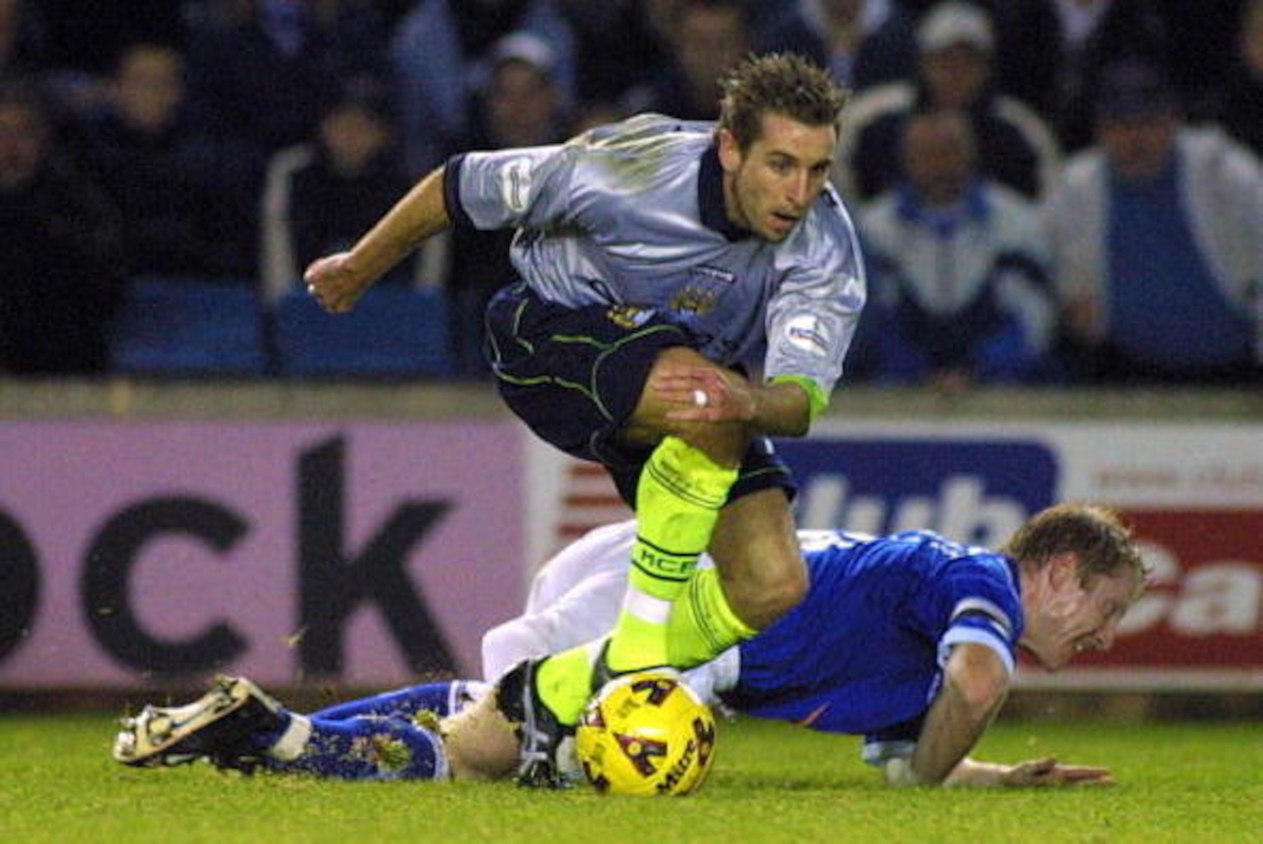 4 Dec 2001:  Darren Huckerby of Manchester City goes past Stuart Nethercott of Millwall during the Nationwide League Division One match between Millwall and Manchester City at The New Den, London. DIGITAL IMAGE.  Mandatory Credit: Craig Prentis/ALLSPORT