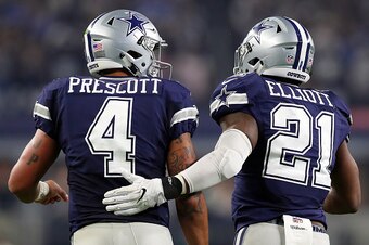ARLINGTON, TX - NOVEMBER 24:   Dak Prescott #4 of the Dallas Cowboys celebrates with Ezekiel Elliott #21 after scoring a touchdown during the fourth quarter against the Washington Redskins at AT&T Stadium on November 24, 2016 in Arlington, Texas.  (Photo 