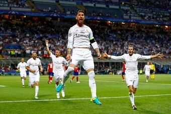 MILAN, ITALY - MAY 28:  Sergio Ramos of Real Madrid celebrates after scoiring the opening goal during the UEFA Champions League Final match between Real Madrid and Club Atletico de Madrid at Stadio Giuseppe Meazza on May 28, 2016 in Milan, Italy.  (Photo 