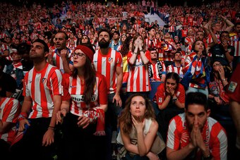 MADRID, SPAIN - MAY 28: Atletico de Madrid fans react during the penalties during the UEFA Champions League Final match between Real Madrid CF and Club Atletico de Madrid at Barclaycard Center on May 28, 2016 in Madrid, Spain. Real Madrid and Atletico de 