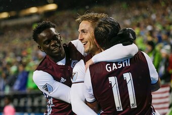 SEATTLE, WA - NOVEMBER 22: From left, Dominique Badji #14 of the Colorado Rapids, Kevin Doyle #9 of the Colorado Rapids and Shkelzen Gashi #11 celebrate a goal by Doyle during the first half of a match in the first leg of the Western Conference Finals at 