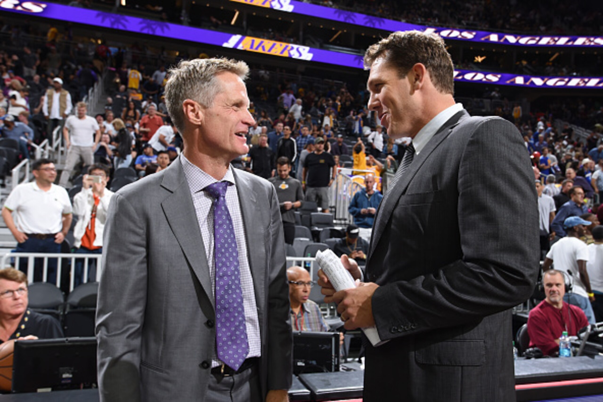 LAS VEGAS, NV - OCTOBER 15: Steve Kerr of the Golden State Warriors and Luke Walton of the Los Angeles Lakers during a preseason game on October 15, 2016 at the T-Mobile Arena in Las Vegas, Nevada. NOTE TO USER: User expressly acknowledges and agrees that