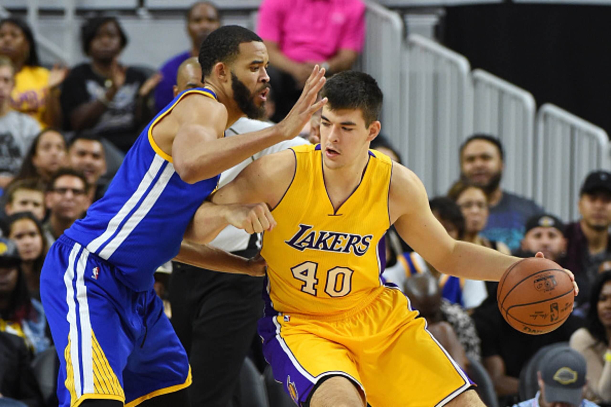 LAS VEGAS, NV - OCTOBER 15:  Ivica Zubac #40 of the Los Angeles Lakers is guarded by JaVale McGee #1 of the Golden State Warriors during their preseason game at T-Mobile Arena on October 15, 2016 in Las Vegas, Nevada. Golden State won 112-107. NOTE TO USE