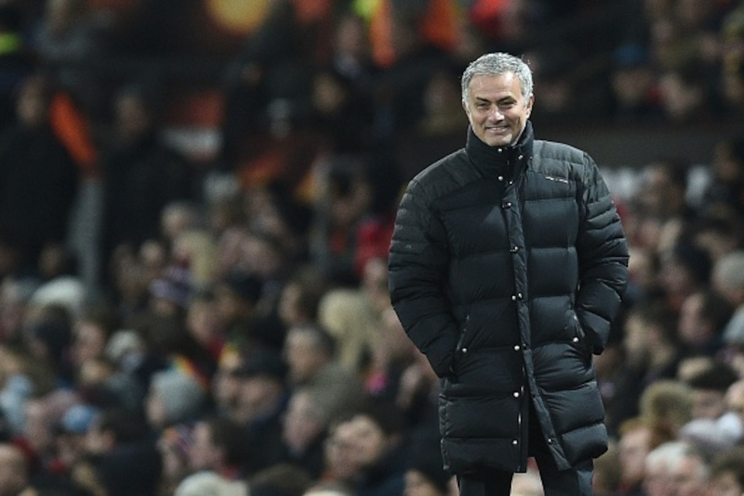 Manchester United's Portuguese manager Jose Mourinho smiles on the touchline during the UEFA Europa League group A football match between Manchester United and Feyenoord at Old Trafford stadium in Manchester, north-west England, on November 24, 2016. / AF