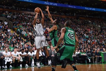 BOSTON, MA - NOVEMBER 25: Kawhi Leonard #2 of the San Antonio Spurs shoots the ball during the game against the Boston Celtics on November 25, 2016 at TD Garden in Boston, Massachusetts. NOTE TO USER: User expressly acknowledges and agrees that, by downlo