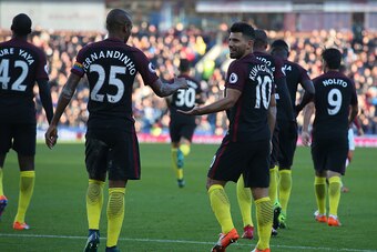 BURNLEY, ENGLAND - NOVEMBER 26:  Sergio Aguero (R) of Manchester City celebrates scoring his team's second goal with his team mate Fernandinho (L) during the Premier League match between Burnley and Manchester City at Turf Moor on November 26, 2016 in Bur