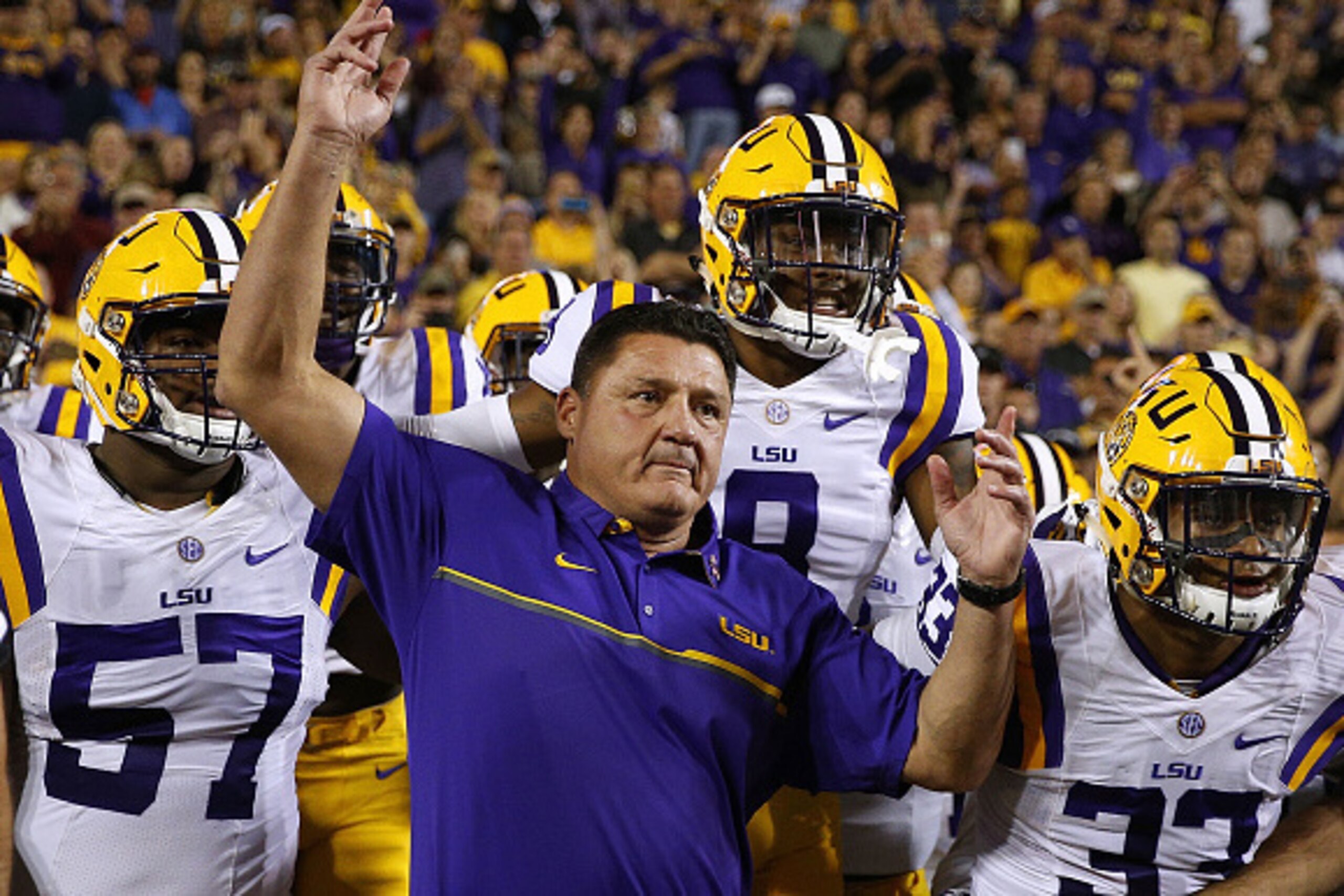 BATON ROUGE, LA - OCTOBER 22: Head coach Ed Orgeron of the LSU Tigers leads his team on the field before a game against the Mississippi Rebels at Tiger Stadium on October 22, 2016 in Baton Rouge, Louisiana.  (Photo by Jonathan Bachman/Getty Images)