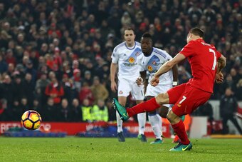 LIVERPOOL, ENGLAND - NOVEMBER 26:  James Milner of Liverpool converts the penalty to score his team's second goal during the Premier League match between Liverpool and Sunderland at Anfield on November 26, 2016 in Liverpool, England.  (Photo by Clive Brun