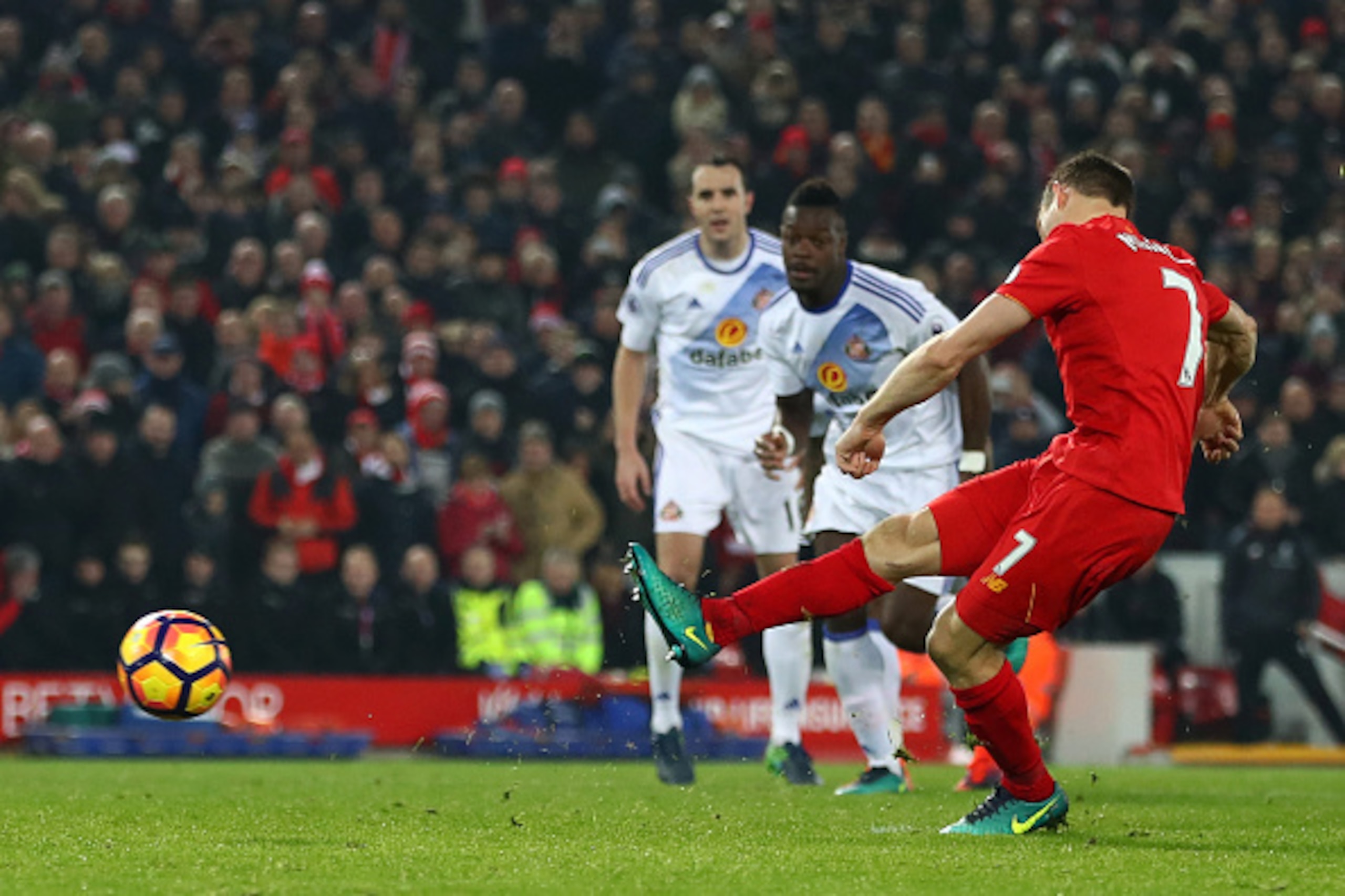 LIVERPOOL, ENGLAND - NOVEMBER 26:  James Milner of Liverpool converts the penalty to score his team's second goal during the Premier League match between Liverpool and Sunderland at Anfield on November 26, 2016 in Liverpool, England.  (Photo by Clive Brun