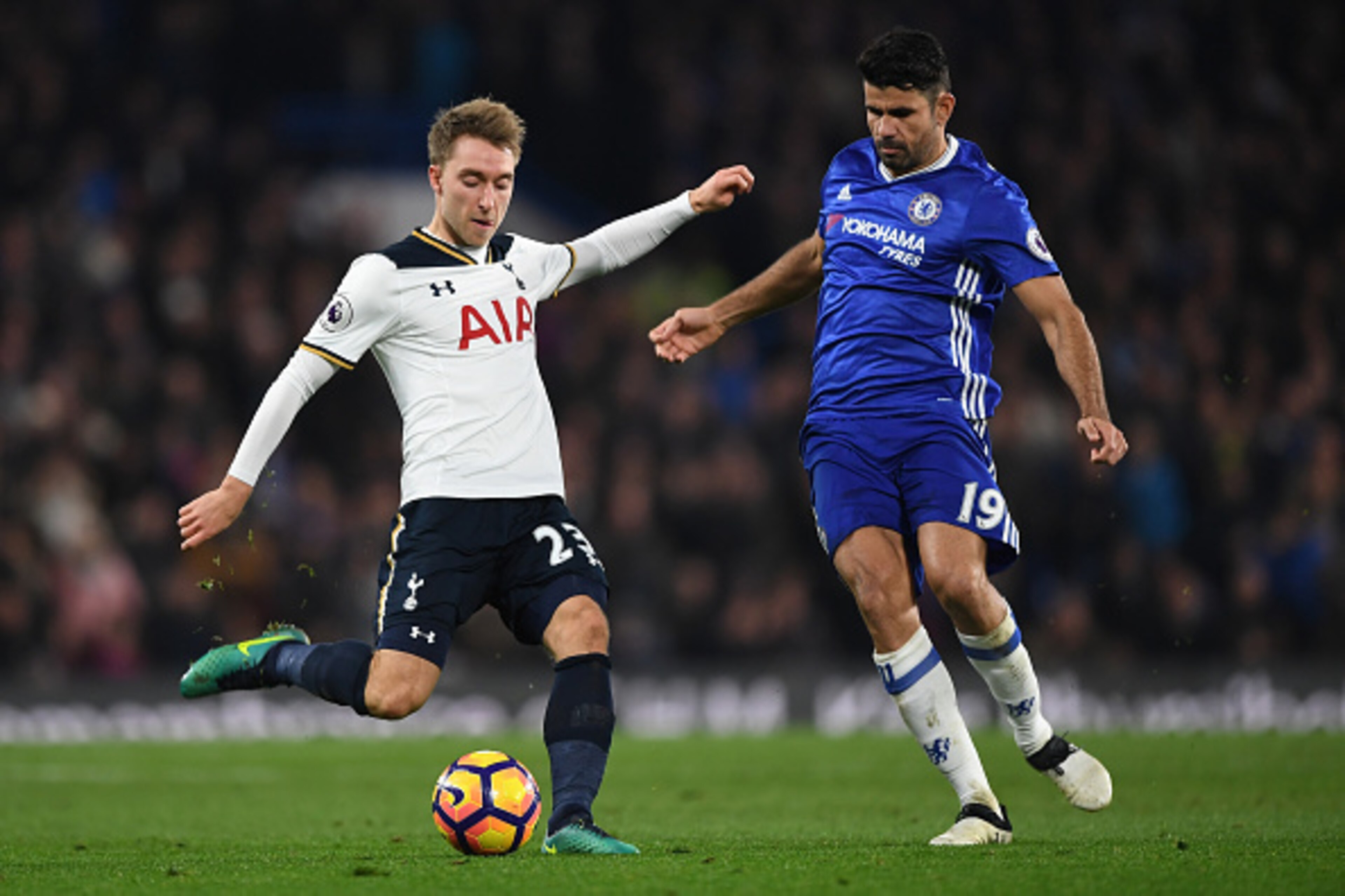 LONDON, ENGLAND - NOVEMBER 26: Christian Eriksen of Tottenham Hotspur and Diego Costa of Chelsea compete for the ball during the Premier League match between Chelsea and Tottenham Hotspur at Stamford Bridge on November 26, 2016 in London, England.  (Photo