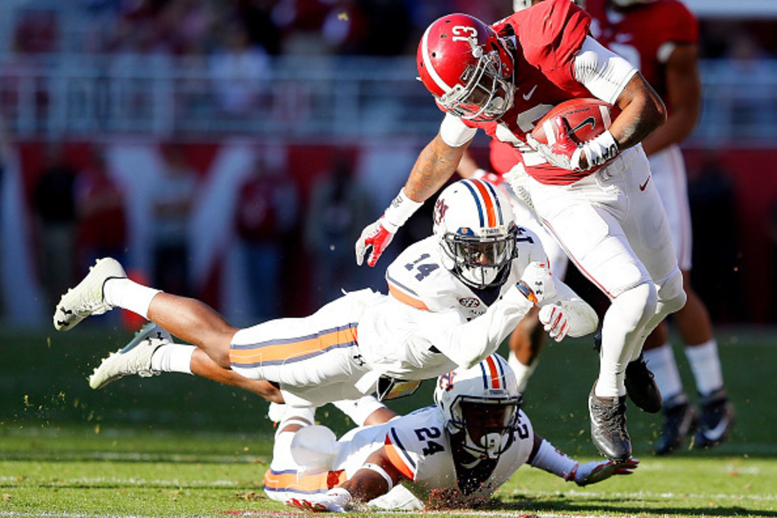 TUSCALOOSA, AL - NOVEMBER 26: Stephen Roberts #14 of the Auburn Tigers dives to tackle ArDarius Stewart #13 of the Alabama Crimson Tide at Bryant-Denny Stadium on November 26, 2016 in Tuscaloosa, Alabama. (Photo by Kevin C. Cox/Getty Images) TUSCALOOSA, AL - NOVEMBER 26: Stephen Roberts #14 of the Auburn Tigers dives to tackle ArDarius Stewart #13 of the Alabama Crimson Tide at Bryant-Denny Stadium on November 26, 2016 in Tuscaloosa, Alabama. (Photo by Kevin C. Cox/Getty Images)