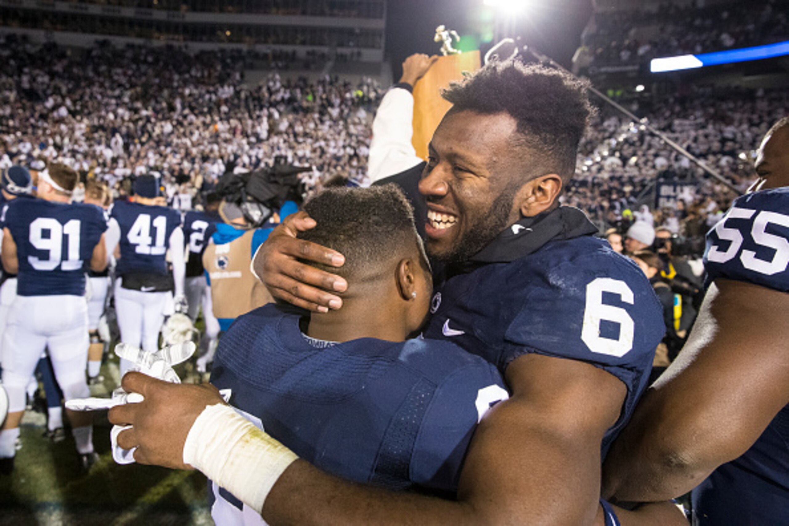 UNIVERSITY PARK, PA - NOVEMBER 26:  Malik Golden #6 of the Penn State Nittany Lions celebrates with Mark Allen #8 after the game against the Michigan State Spartans on November 26, 2016 at Beaver Stadium in University Park, Pennsylvania. Penn State defeat