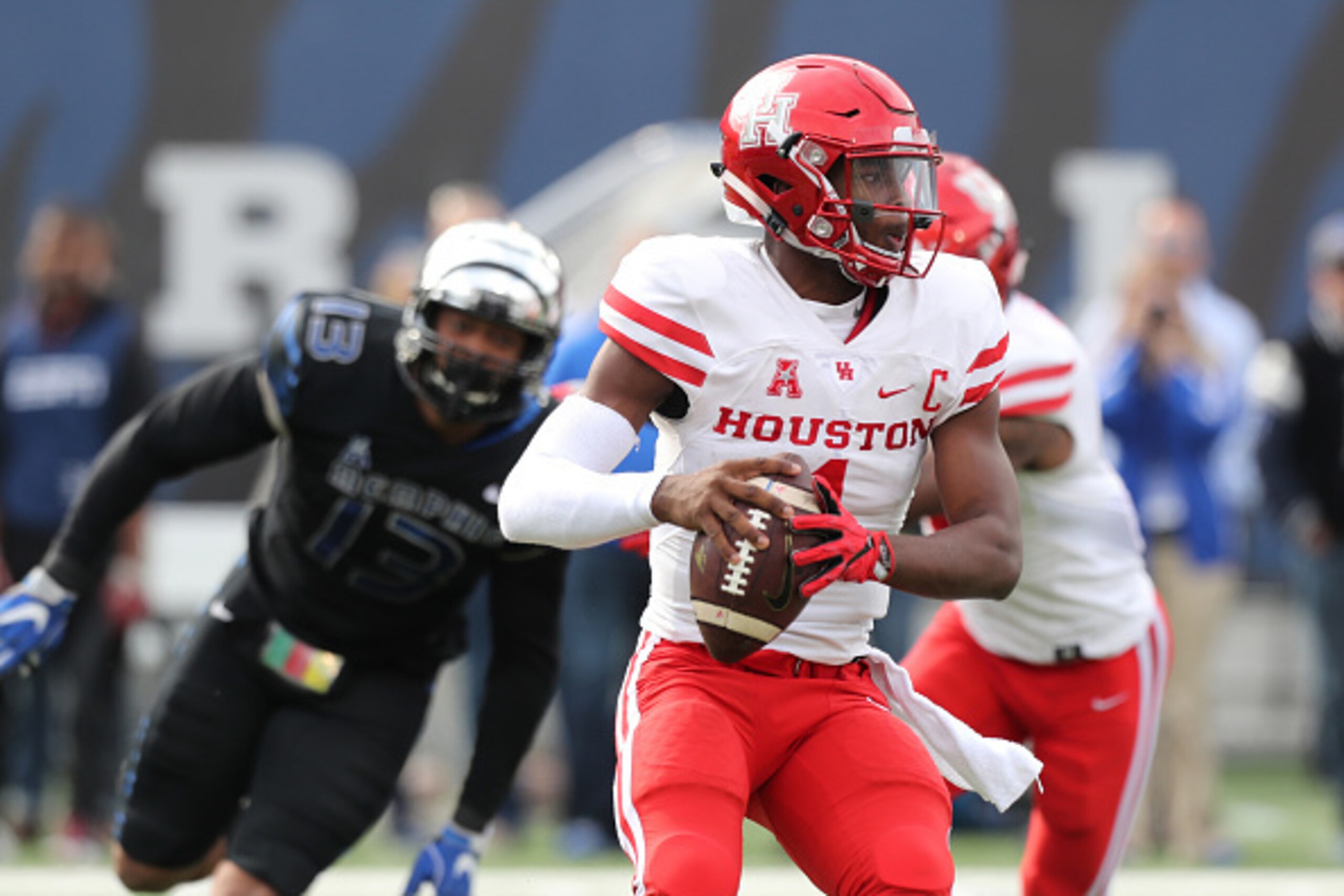 MEMPHIS, TN - NOVEMBER 25: Greg Ward Jr. #1 of the Houston Cougars scrambles with the ball against the Memphis Tigers on November 25, 2016 at Liberty Bowl Memorial Stadium in Memphis, Tennessee. Memphis defeated Houston 48-44. (Photo by Joe Murphy/Getty I