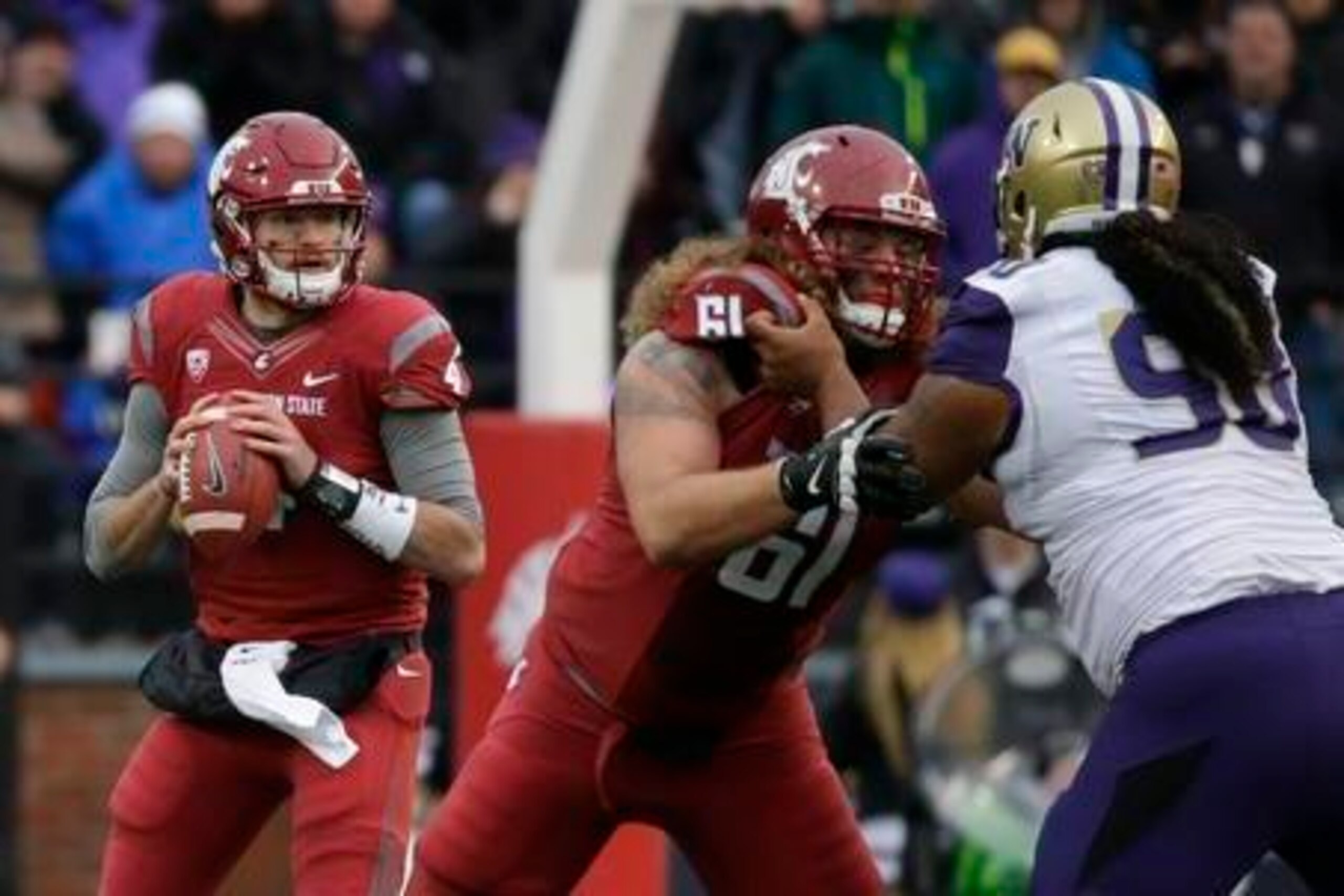 Washington's defense harassed Luke Falk all day in the Apple Cup.