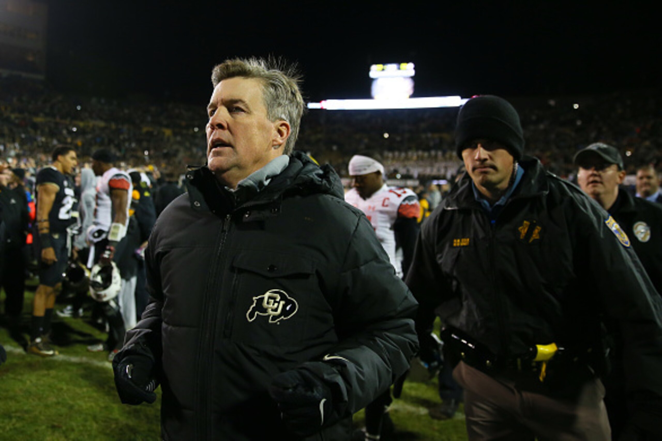 BOULDER, CO - NOVEMBER 26:  Head Coach Mike MacIntyre of the Colorado Buffaloes runs off the field after defeating the Utah Utes at Folsom Field on November 26, 2016 in Boulder, Colorado. Colorado defeated Utah 27-22 and win the Pac-12 South. The Buffaloe