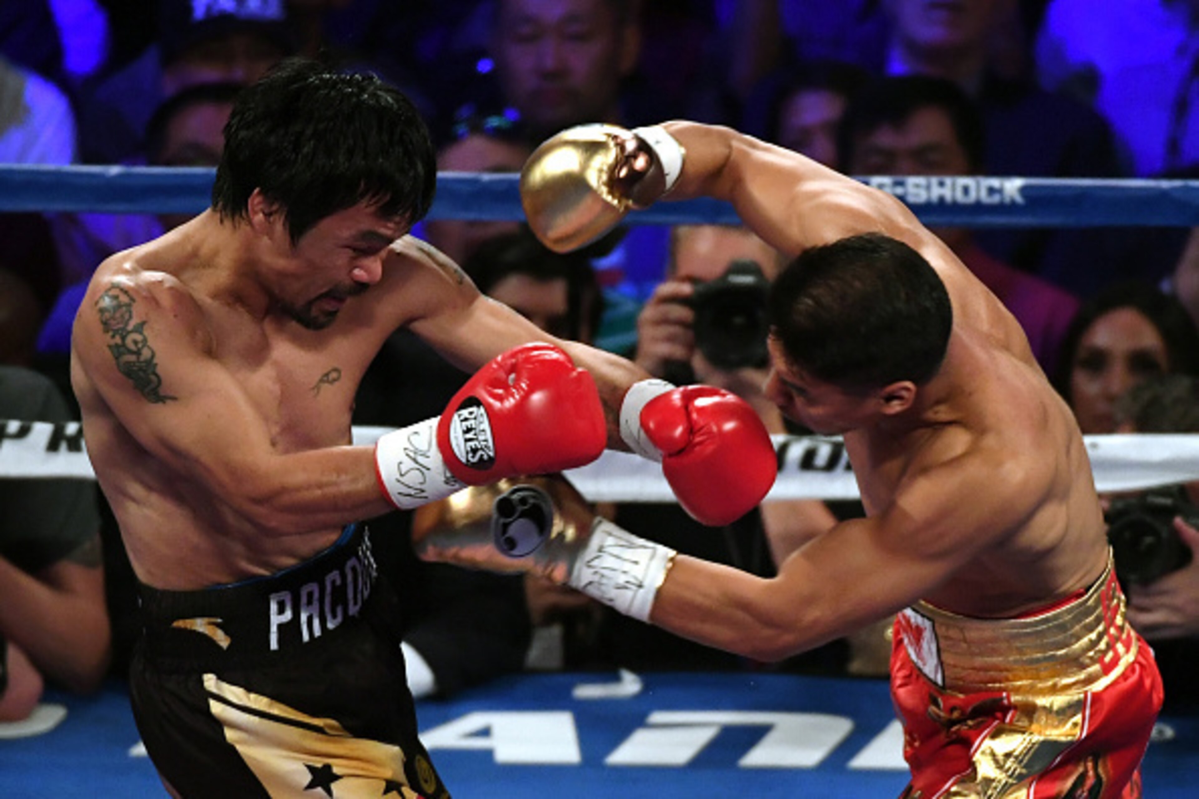 LAS VEGAS, NV - NOVEMBER 05:  Manny Pacquiao (L) and Jessie Vargas battle in the first round of their WBO welterweight championship fight at the Thomas & Mack Center on November 5, 2016 in Las Vegas, Nevada. Pacquiao won by unanimous decision.  (Photo by 