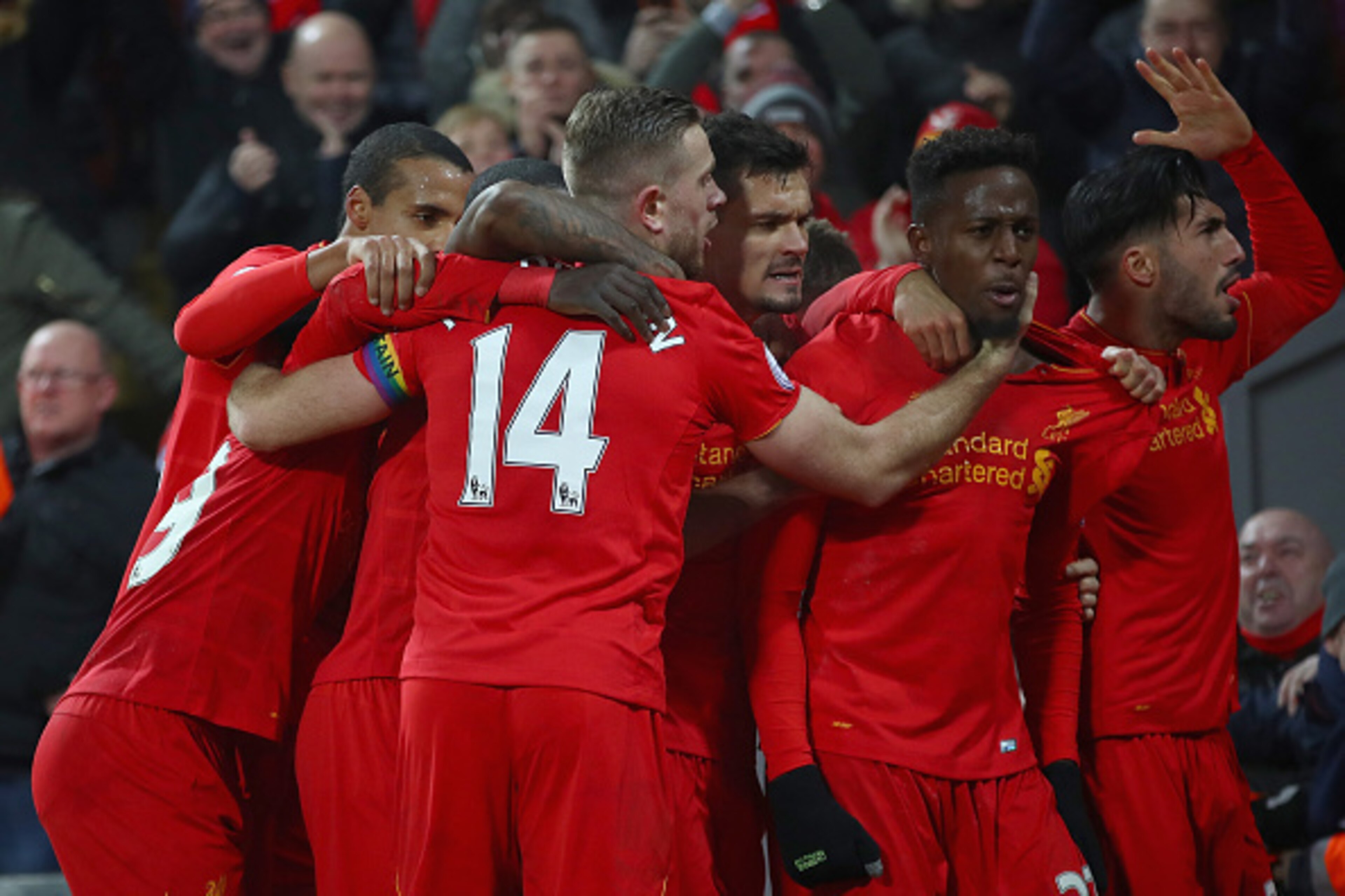 LIVERPOOL, ENGLAND - NOVEMBER 26: Divock Origi (2nd R) of Liverpool celebrates scoring the opening goal with his captain Jordan Henderson (14) and his team mates during the Premier League match between Liverpool and Sunderland at Anfield on November 26, LIVERPOOL, ENGLAND - NOVEMBER 26: Divock Origi (2nd R) of Liverpool celebrates scoring the opening goal with his captain Jordan Henderson (14) and his team mates during the Premier League match between Liverpool and Sunderland at Anfield on November 26,