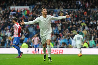 MADRID, SPAIN - NOVEMBER 26:  Cristiano Ronaldo of Real Madrid celebrates after scoring Real's 2nd goal from during the La Liga match between Real Madrid CF and Real Sporting de Gijon at Estadio Santiago Bernabeu on November 26, 2016 in Madrid, Spain.  (P