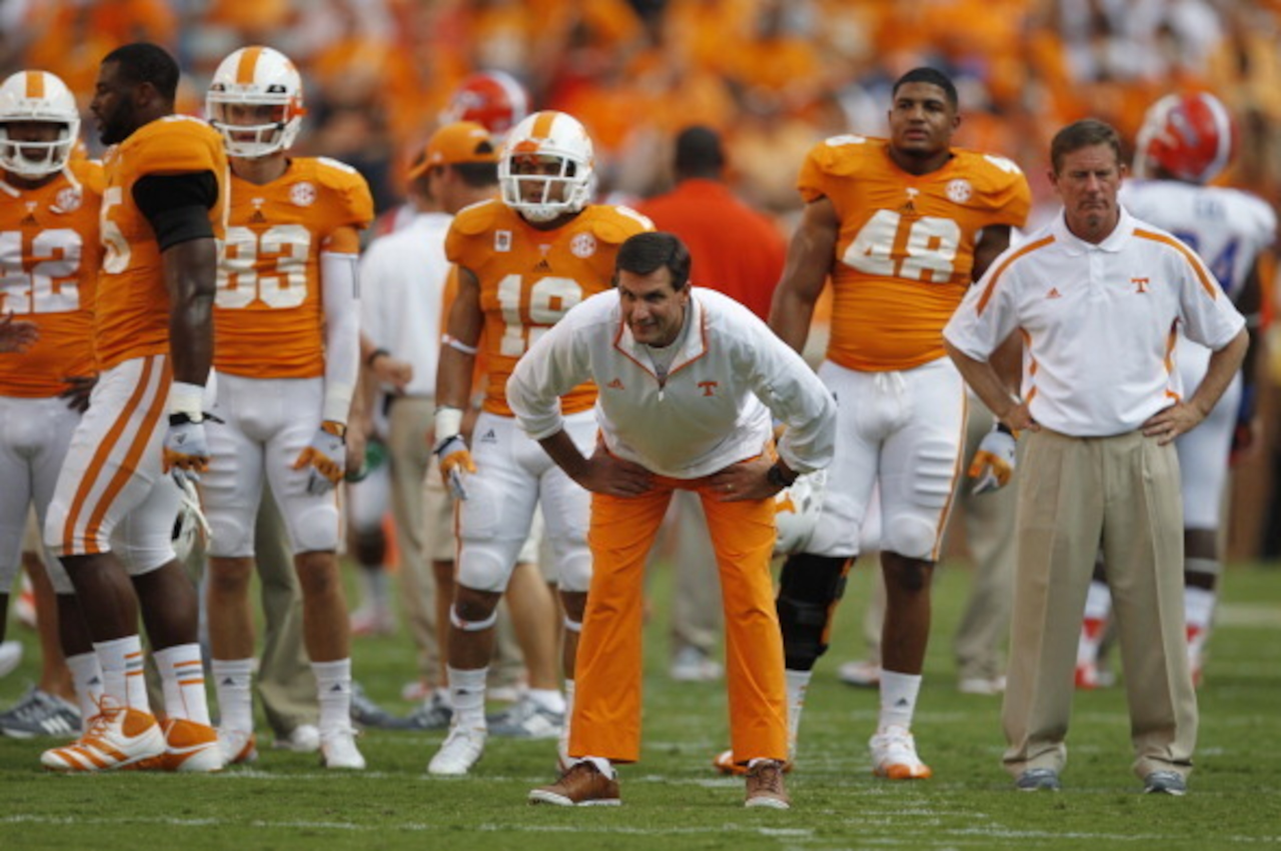 KNOXVILLE, TN - SEPTEMBER 15: Derek Dooley head coach of the Tennessee Volunteers during pregame warm-ups before their game against the  Florida Gators at Neyland Stadium on September 15, 2012 in Knoxville, Tennessee.    (Photo by John Sommers II/Getty Im