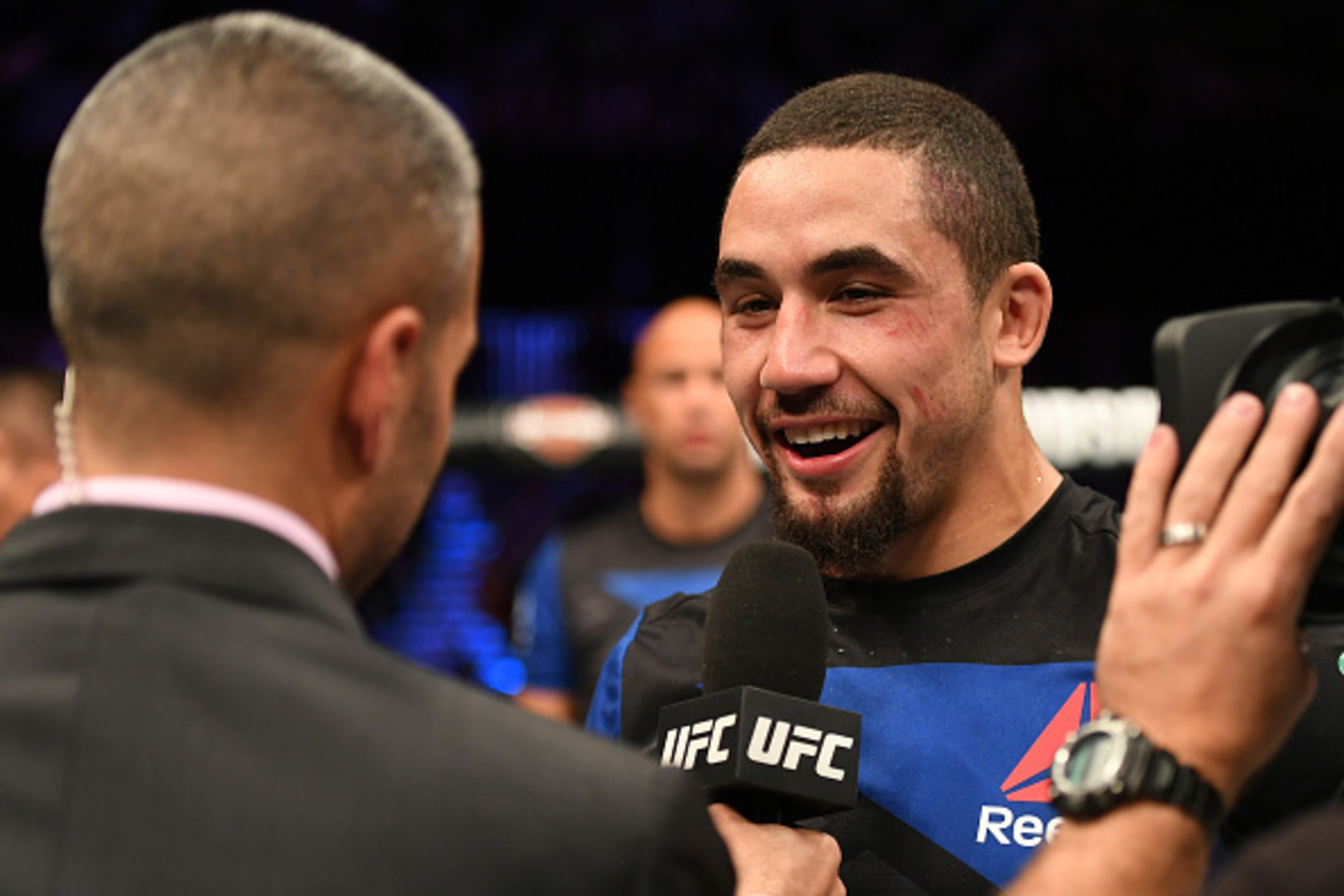 MELBOURNE, AUSTRALIA - NOVEMBER 27:   Robert Whittaker of New Zealand is interviewed after his TKO victory over Derek Brunson in their middleweight bout during the UFC Fight Night event at Rod Laver Arena on November 27, 2016 in Melbourne, Australia. (Pho