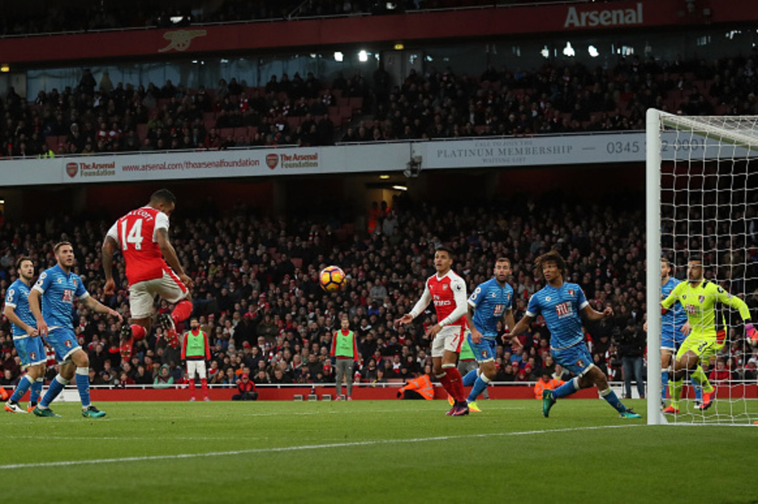 LONDON, ENGLAND - NOVEMBER 27:  Theo Walcott of Arsenal scores his team's second goal during the Premier League match between Arsenal and AFC Bournemouth at Emirates Stadium on November 27, 2016 in London, England.  (Photo by Matthew Ashton - AMA/Getty Im