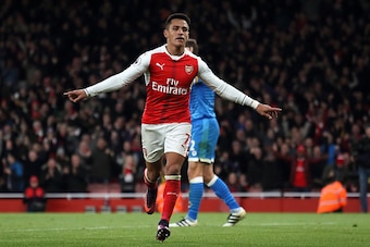 LONDON, ENGLAND - NOVEMBER 27:  Alexis Sanchez of Arsenal celebrates scoring his team's third goal during the Premier League match between Arsenal and AFC Bournemouth at Emirates Stadium on November 27, 2016 in London, England.  (Photo by Matthew Ashton -