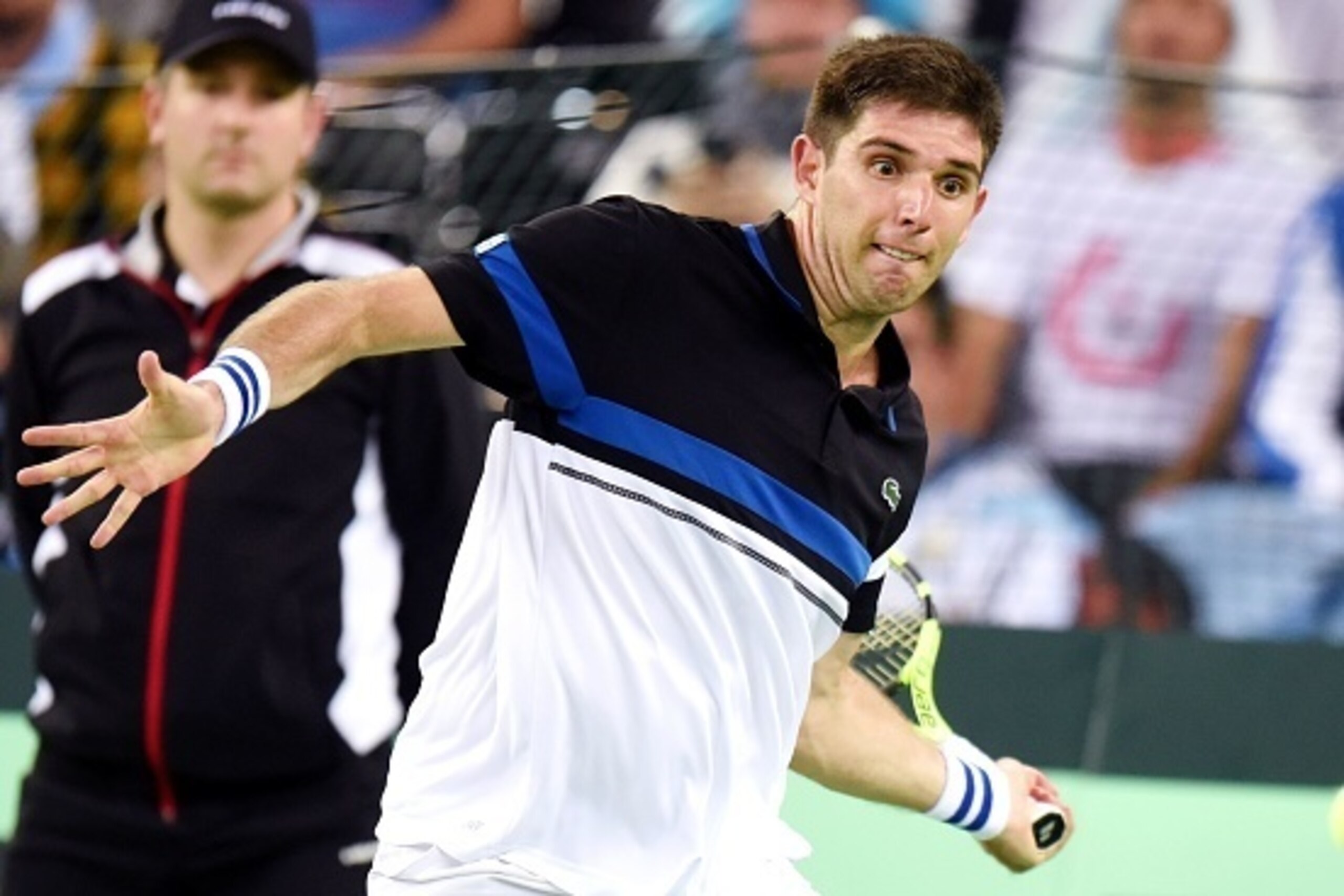 Argentina's Federico Delbonis returns ball to Croatia's Marin Cilic during the Davis Cup World Group final singles match between Croatia and Argentina at the Arena hall in Zagreb, on November 25, 2016. / AFP / STRINGER        (Photo credit should read STR