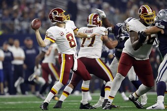 ARLINGTON, TX - NOVEMBER 24:   Kirk Cousins #8 of the Washington Redskins throws a pass during the fourth quarter against the Dallas Cowboys at AT&T Stadium on November 24, 2016 in Arlington, Texas.  (Photo by Ronald Martinez/Getty Images)