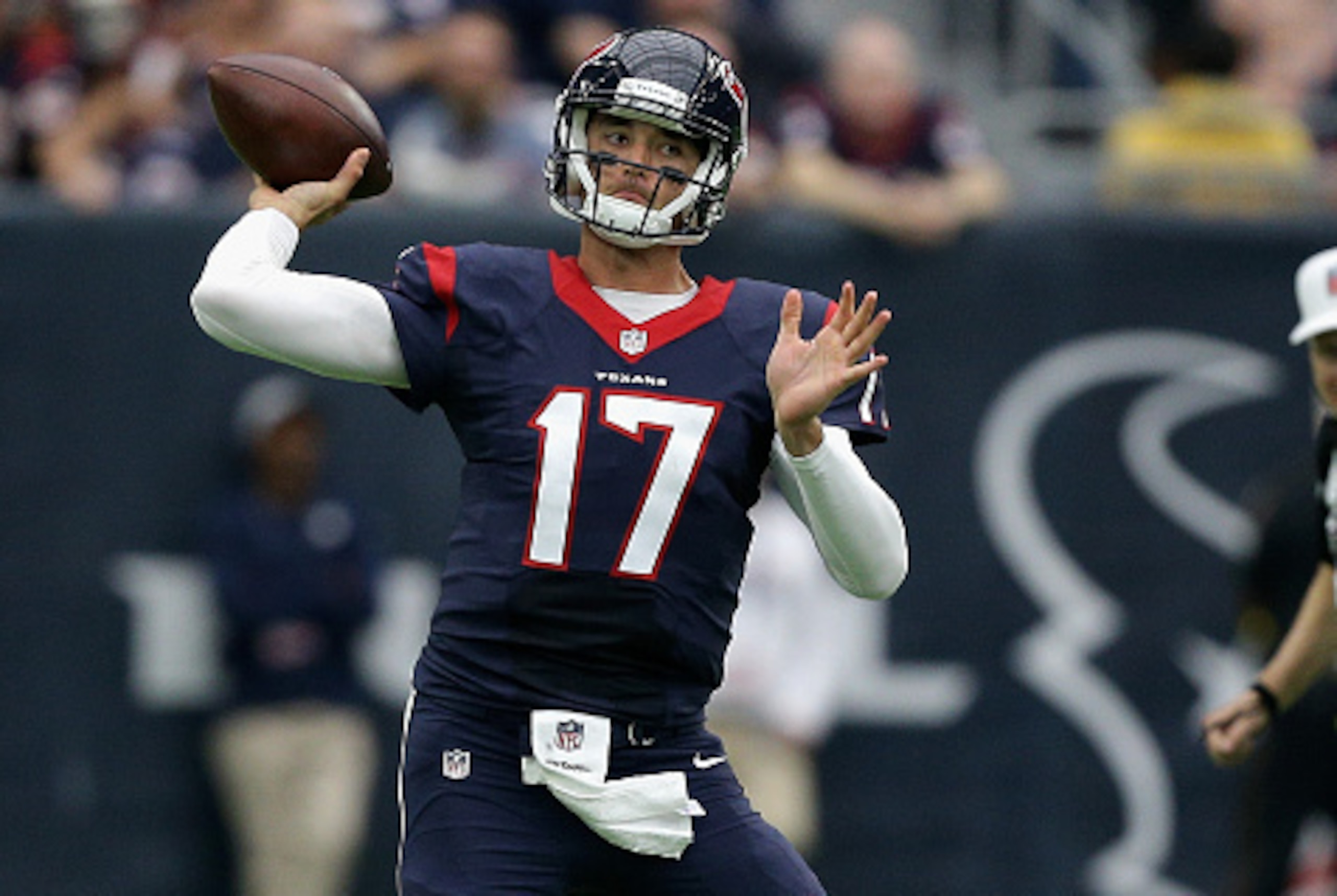 HOUSTON, TX - NOVEMBER 27:  Brock Osweiler #17 of the Houston Texans throws off balance in the second quarter against the San Diego Chargers at NRG Stadium on November 27, 2016 in Houston, Texas.  (Photo by Bob Levey/Getty Images)
