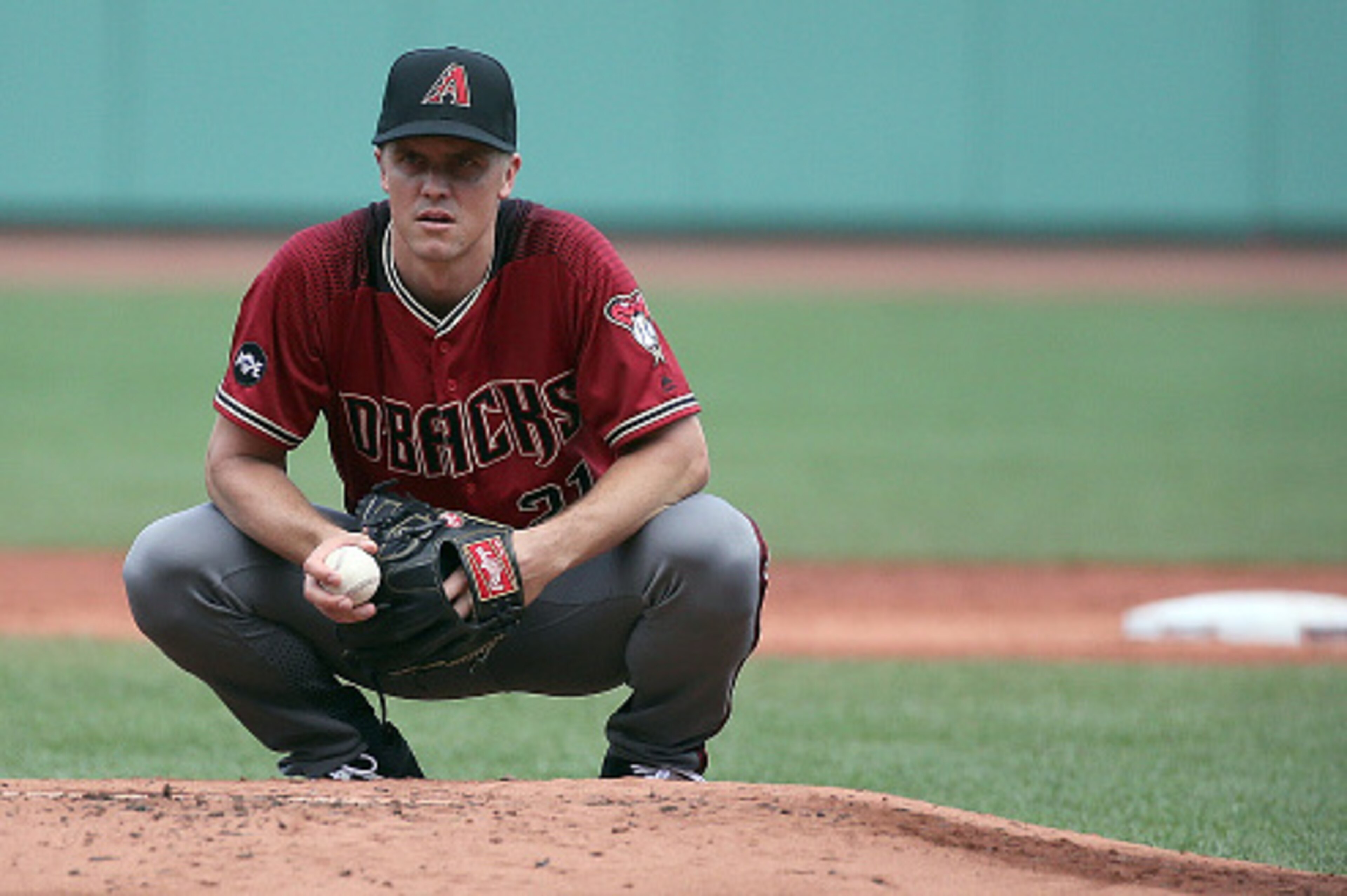 BOSTON, MA - AUGUST 14: Zack Greinke #21 of the Arizona Diamondbacks prepares to throw against the Boston Red Sox in the first inning at Fenway Park on August 14, 2016 in Boston, Massachusetts. (Photo by Jim Rogash/Getty Images) BOSTON, MA - AUGUST 14: Zack Greinke #21 of the Arizona Diamondbacks prepares to throw against the Boston Red Sox in the first inning at Fenway Park on August 14, 2016 in Boston, Massachusetts. (Photo by Jim Rogash/Getty Images)