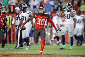 TAMPA, FL - NOVEMBER 27: Bradley McDougald #30 of the Tampa Bay Buccaneers celebrates after an interception against the Seattle Seahawks in the fourth quarter of the game at Raymond James Stadium on November 27, 2016 in Tampa, Florida. The Buccaneers defe