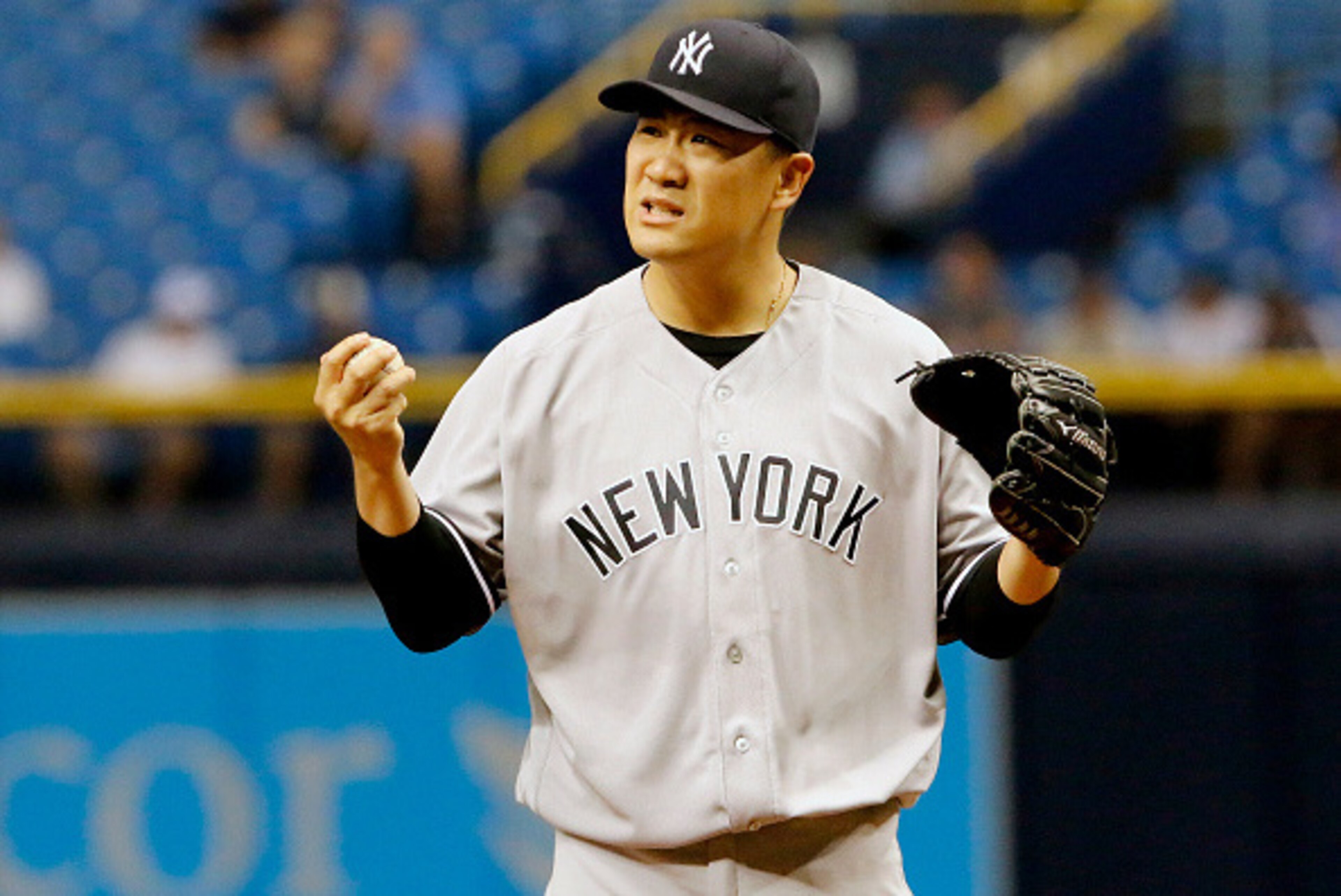 ST. PETERSBURG, FL - SEPTEMBER 21:  Starting pitcher Masahiro Tanaka #19 of the New York Yankees pauses before pitching in the fifth inning of their game against the Tampa Bay Rays at Tropicana Field on September 21, 2016 in Tampa, Florida. (Photo by Jose