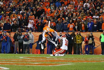 DENVER, CO - NOVEMBER 27:  Wide receiver Tyreek Hill #10 of the Kansas City Chiefs scores a touchdown while defended by cornerback Bradley Roby #29 of the Denver Broncos in the fourth quarter at Sports Authority Field at Mile High on November 27, 2016 in 