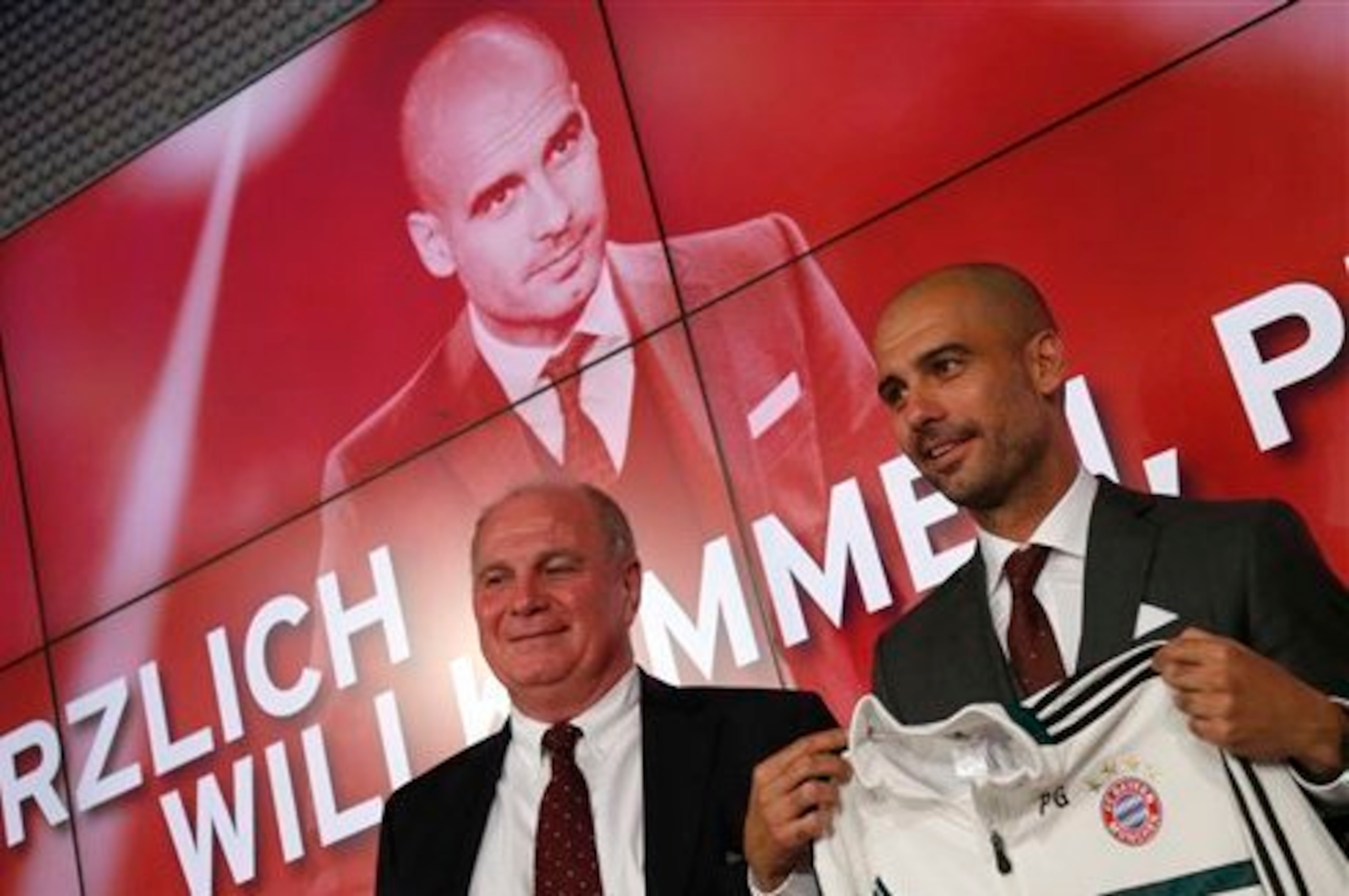 Hoeness' dinner table demeanour convinced Guardiola (right) to join Bayern.