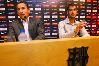 Barcelona's technical director Txiki Begiristain (L) and football coach of Barcelona Josep Guardiola (R) talk during a press conference to explain the dispute over Lionel Messi and his participation in the Olympic Games in China on August 7, 2008 in Barce