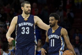 PHILADELPHIA, PA - NOVEMBER 23: Marc Gasol #33 and Mike Conley #11 of the Memphis Grizzlies celebrate against the Philadelphia 76ers in overtime at Wells Fargo Center on November 23, 2016 in Philadelphia, Pennsylvania. The Memphis Grizzlies defeated the P