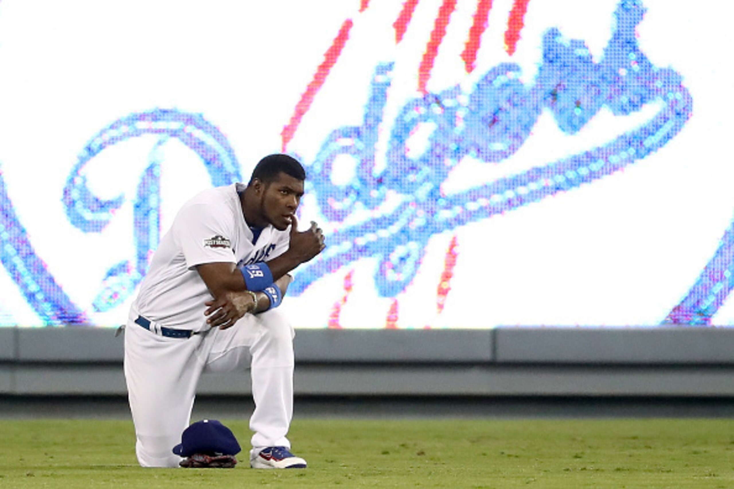 LOS ANGELES, CA - OCTOBER 20:  Yasiel Puig #66 of the Los Angeles Dodgers reacts in the outfield in the eighth inning against the Chicago Cubs in game five of the National League Division Series at Dodger Stadium on October 20, 2016 in Los Angeles, Califo